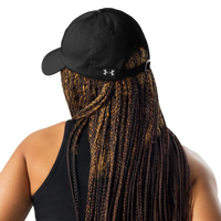 A person with long brown box braids wears a black tank top and a Flesh Parade "Embroidered Logo" Under Armour® Hat backwards, shown from behind against a plain white background.