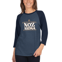 A smiling person wears the Mainstay Entertainment Noz Redna "Candle Logo" 3/4 Sleeve Raglan Shirt—navy cotton blend with long dark sleeves, bold NOZ REDNA text, and a small flame icon on the front.