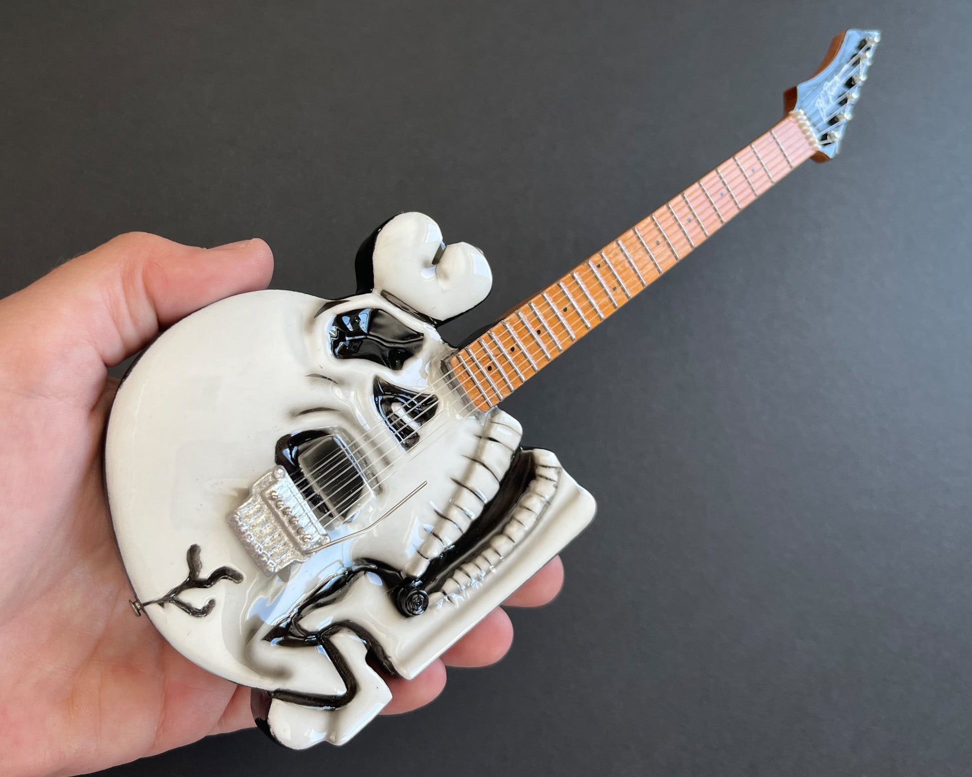 Poison "B.C. Rich® Official - C.C. DeVille Skull" Licensed Mini Guitar - Mainstay Entertainment