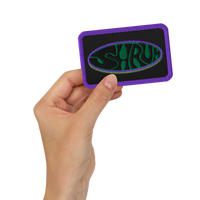 A hand holds the SHRÜM 