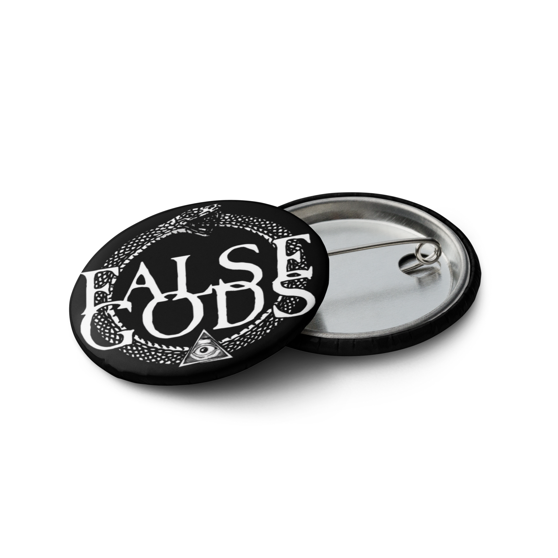 The Mainstay Entertainment False Gods "Snake Logo" Set includes 5 round black pin-back buttons with white text, an eye-in-triangle symbol, and circular snake design. Each button has a glossy UV-resistant finish and a partially open back showing the metal pin.