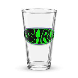 The SHRÜM "Logo" Pint Glass by Mainstay Entertainment is a clear 16 oz shaker pint featuring a green and black oval logo with SHRUM in bold, wavy letters at the center.